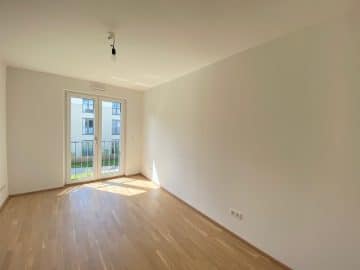 Neuwertige 2 ZKB Wohnung mit Westbalkon in zentraler Lage von Höhenkirchen-Siegertsbrunn - Schlafzimmer